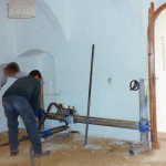 Mechanical cutting of walls in order to create a barrier for rising damp.
